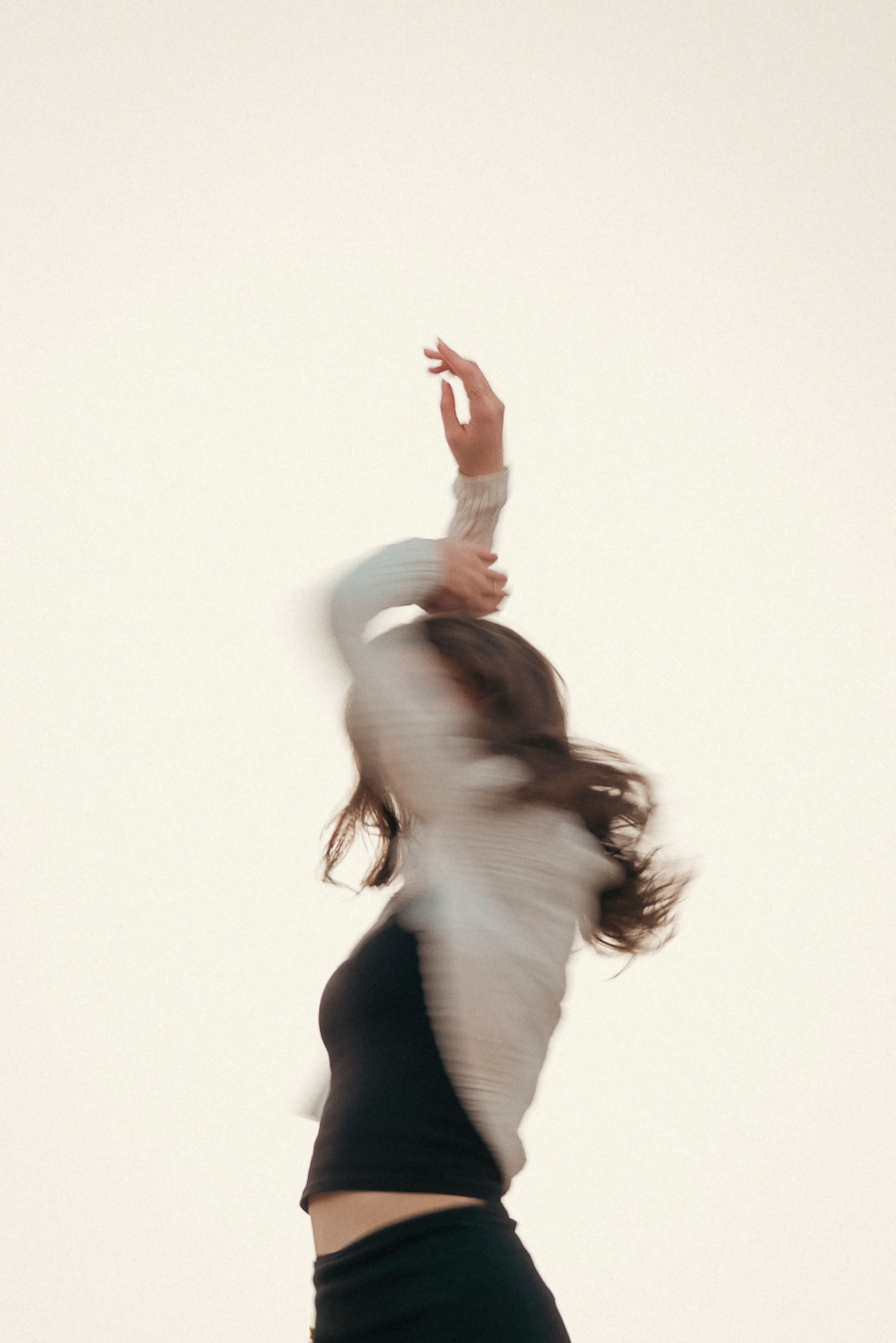 Senior photo of young woman dancing at Sahuaro Ranch Park Glendale, AZ.