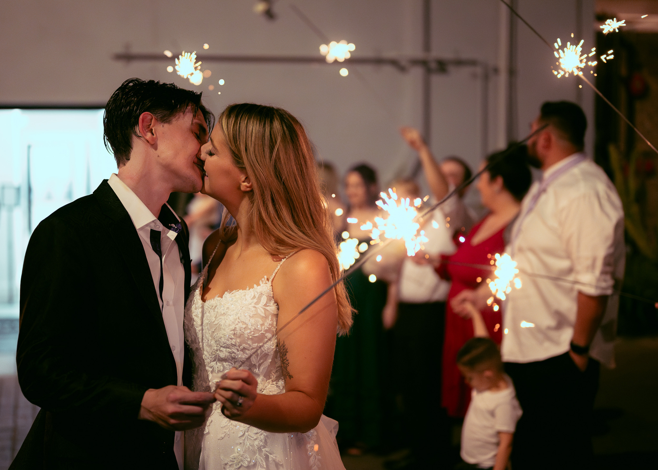 Bride and groom sparkler send off after wedding reception at Tre Bella by Wedgewood in Mesa Arizona.