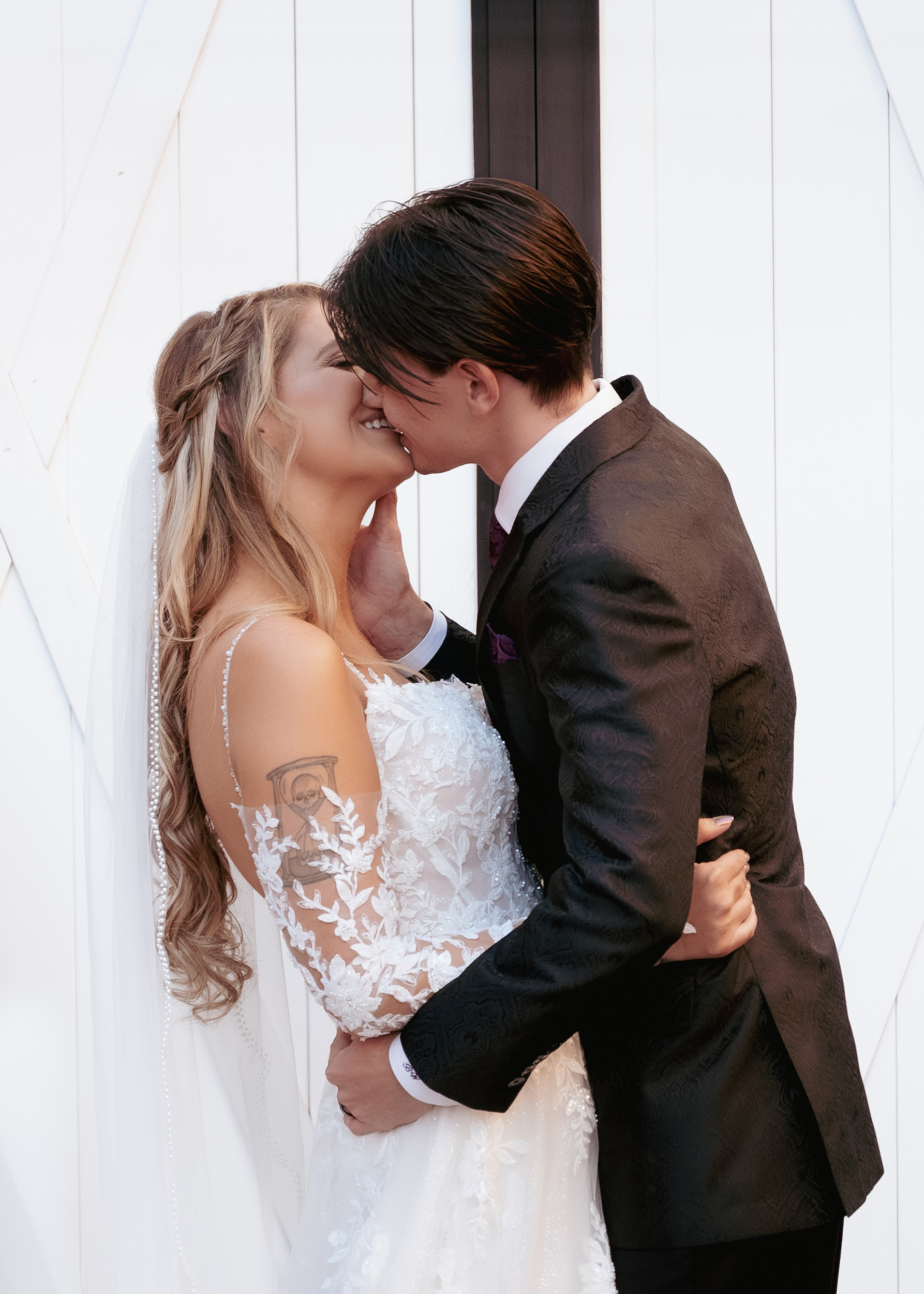 bride and groom kissing after vows at wedding ceremony at Tre Bella Mesa Arizona.
