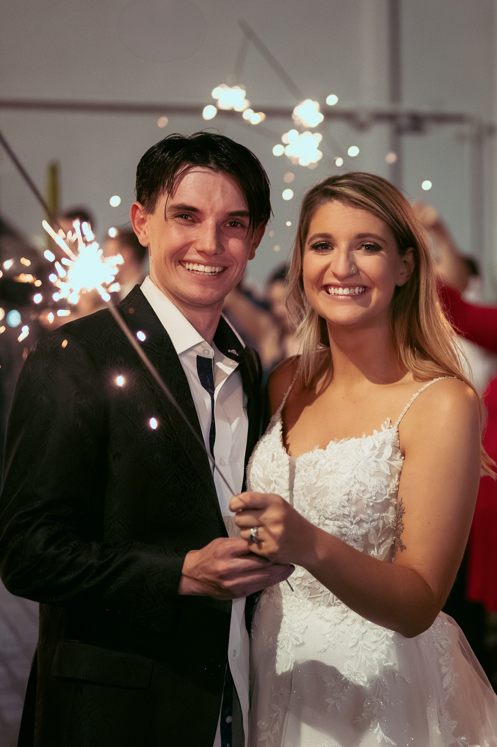 Bride and Groom Mesa, Arizona Main St. Tre Bella after wedding reception holding sparklers.