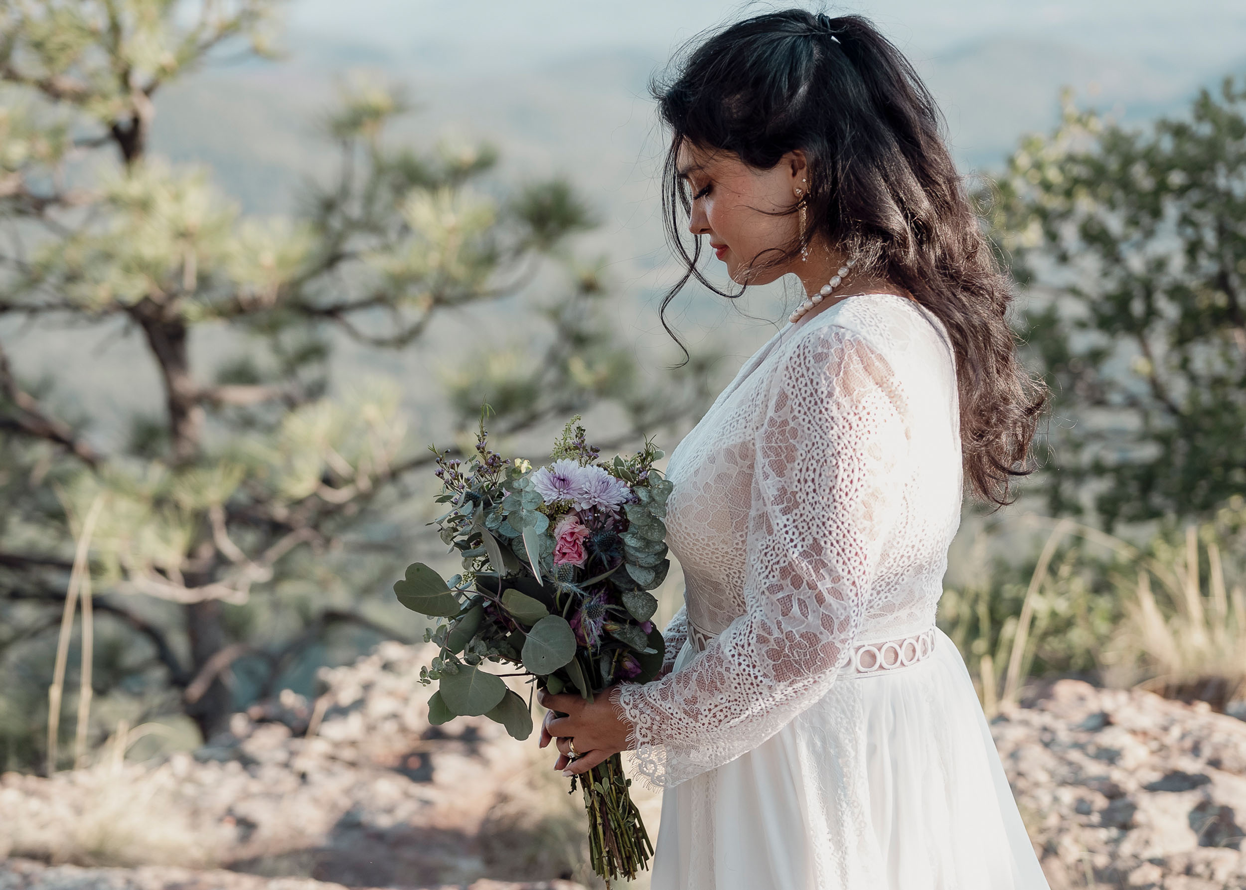 Bride holding bouquet during elopement wedding at the Mogollon Rim in Payson, Arizona