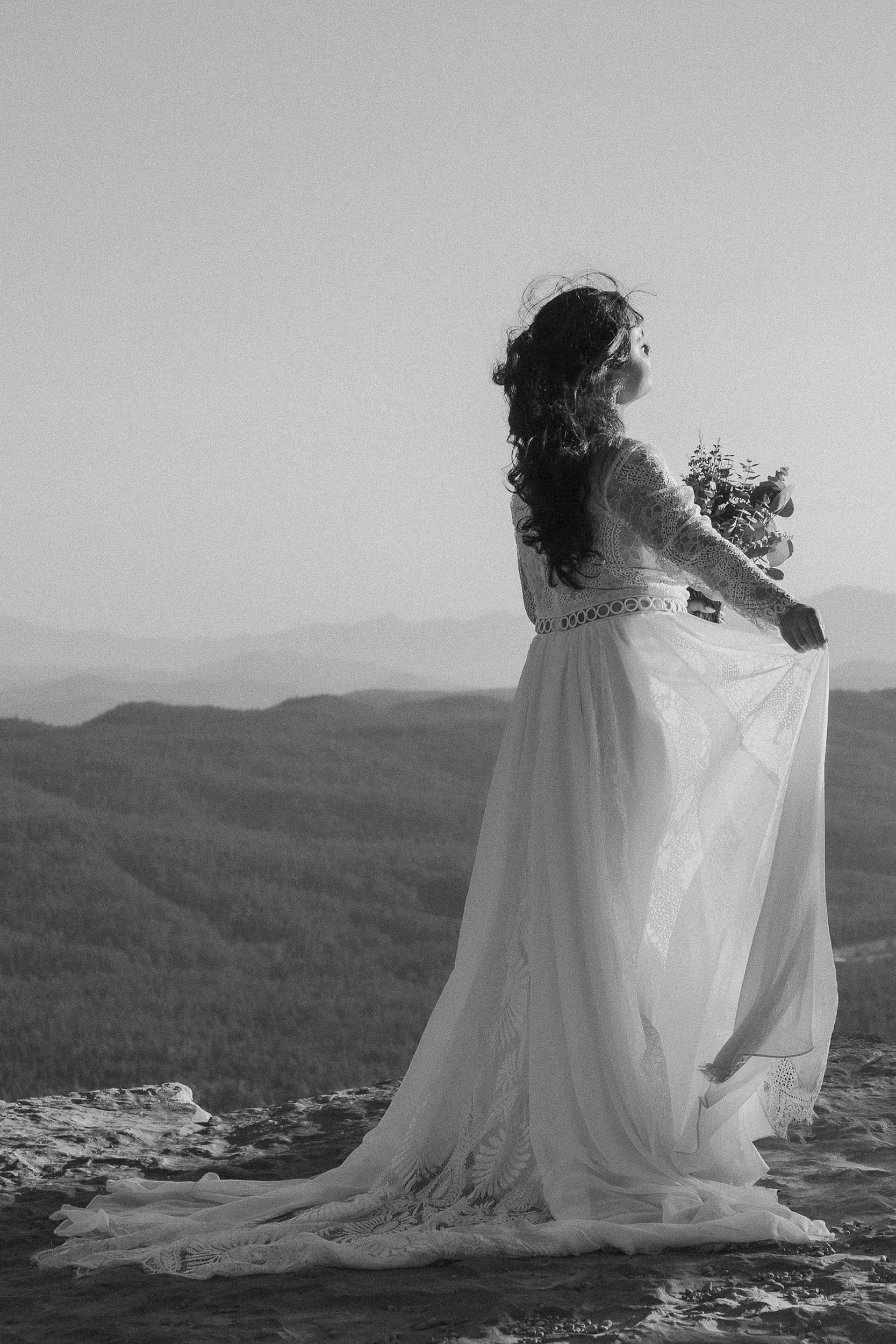 Bridal photography cliffside in nature during elopement wedding at the Mogollon Rim in Payson, Arizona