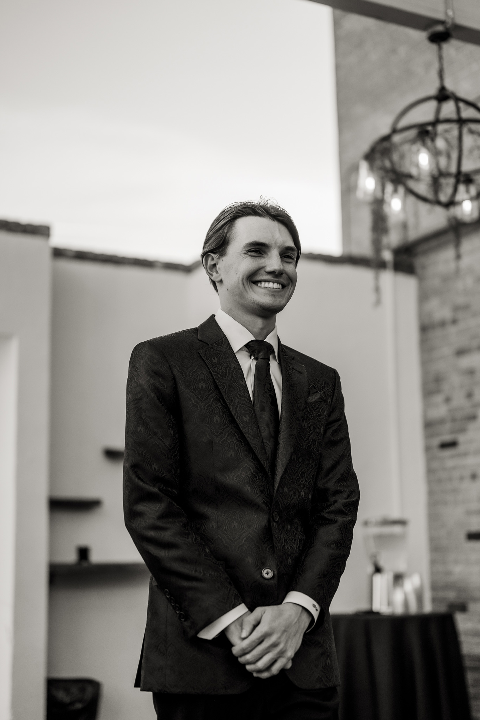 Groom walking down aisle at wedding ceremony at Tre Bella by Wedgewood in Mesa Arizona.