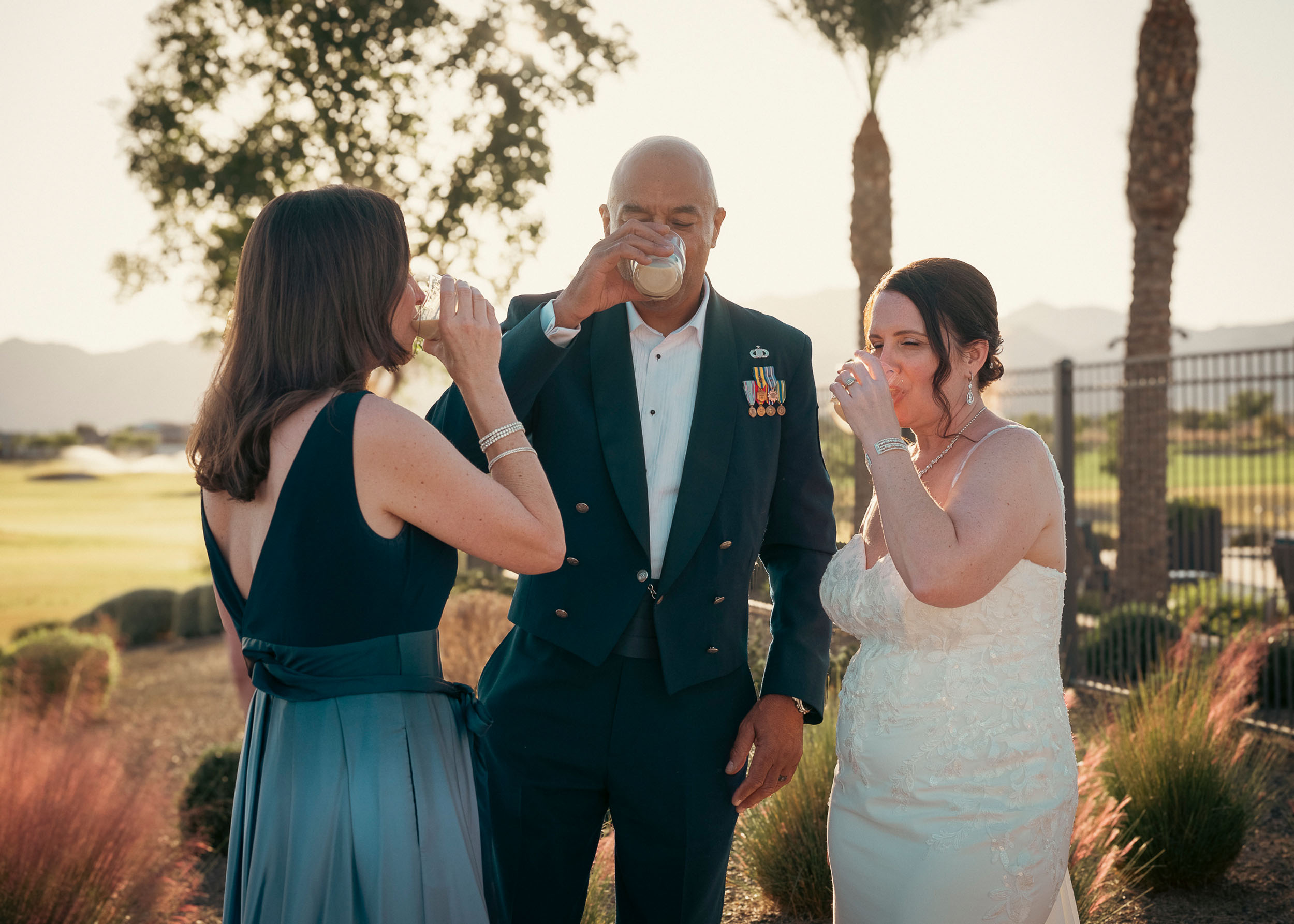 Bride groom and guest drinking celebrating at wedding reception at Sterling Grove, AZ