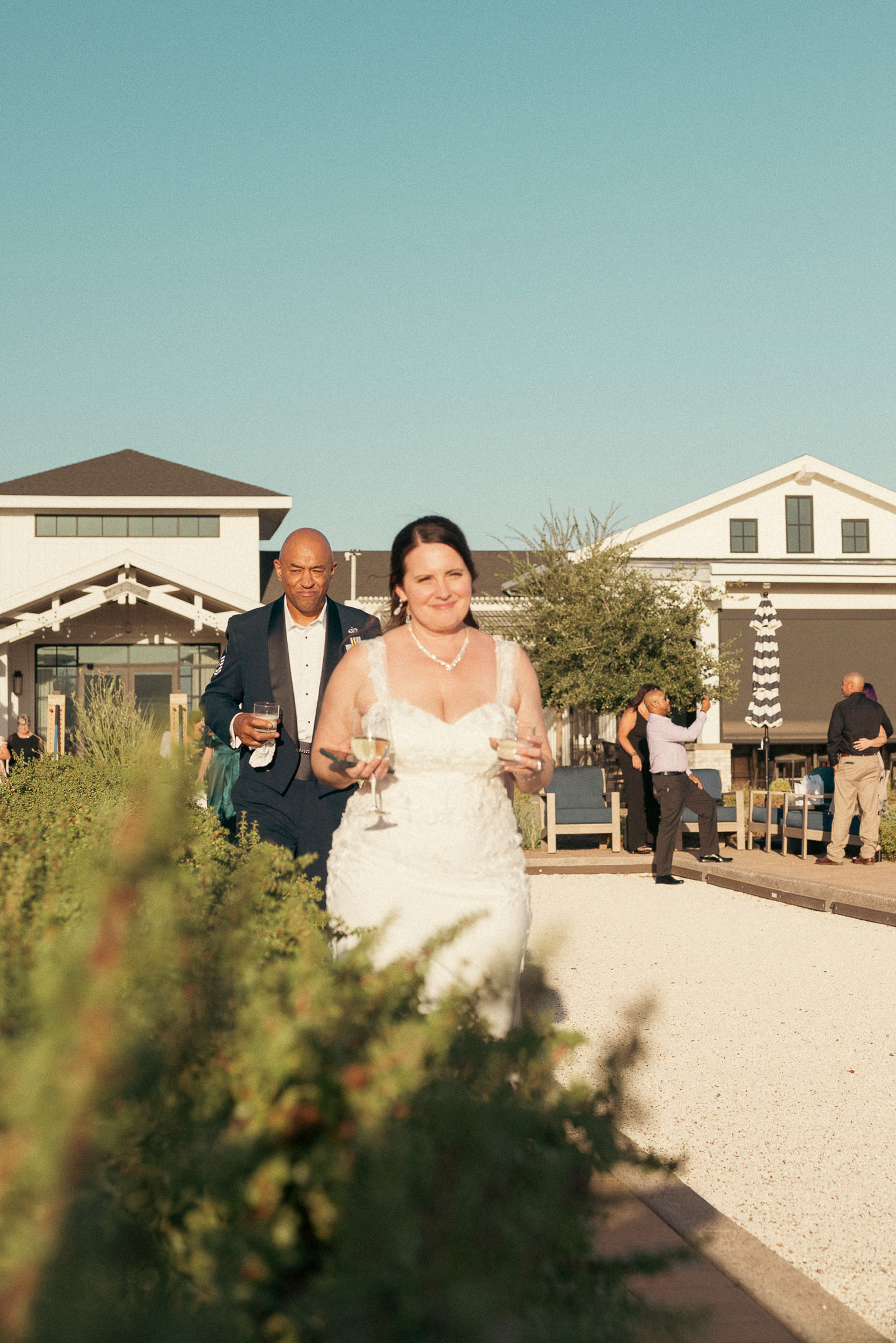 Wedding bride and groom celebrating at Sterling Grove Copper + Rye wedding reception