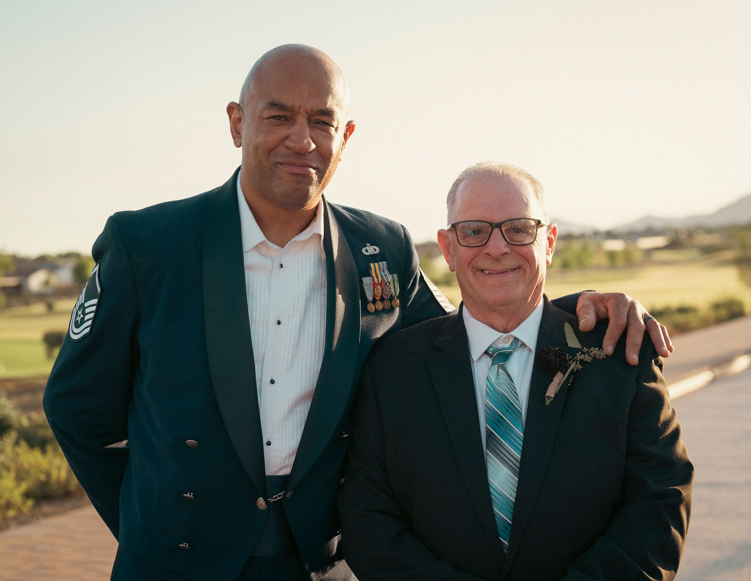 Groom and guest celebrating at Sterling Grove Copper + Rye wedding reception