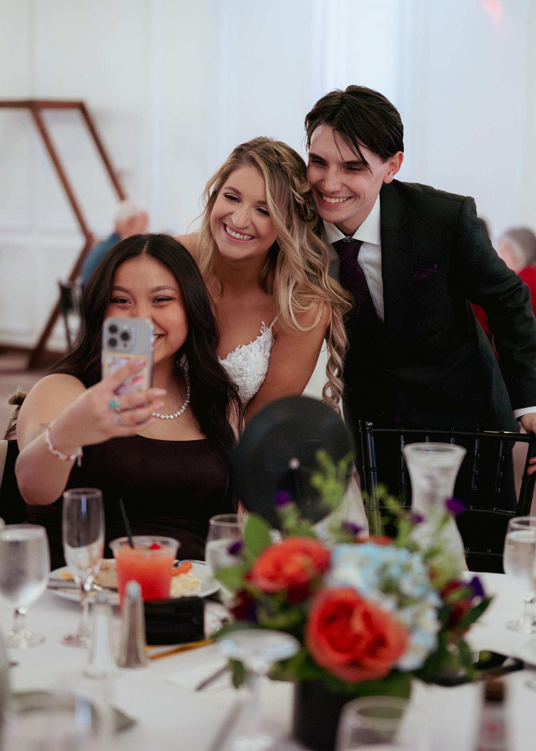 bride, groom and  guest at wedding reception at Tre Bella by Wedgewood in Mesa Arizona.