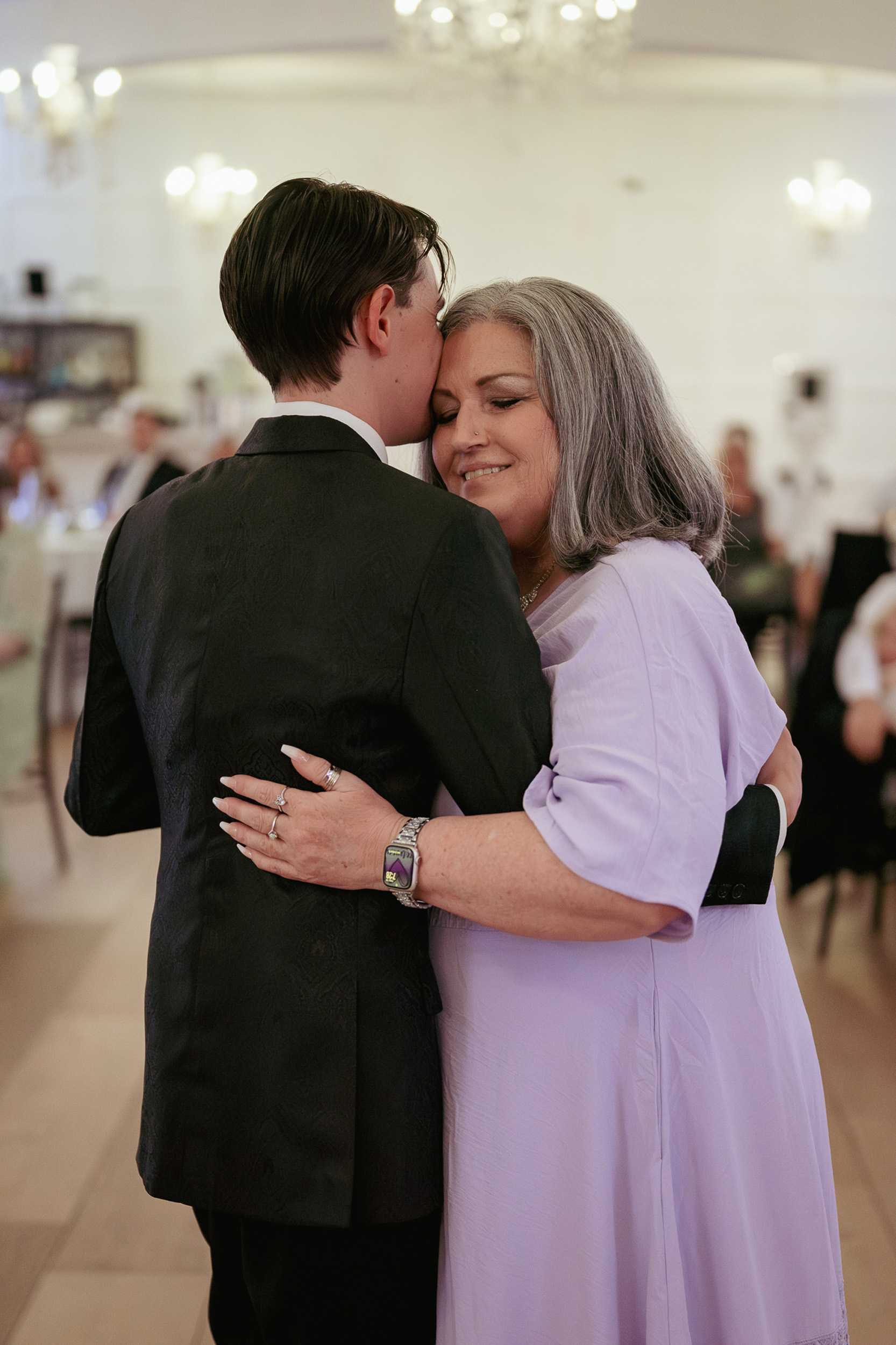 groom dancing with mother at wedding reception at Tre Bella by Wedgewood in Mesa Arizona.
