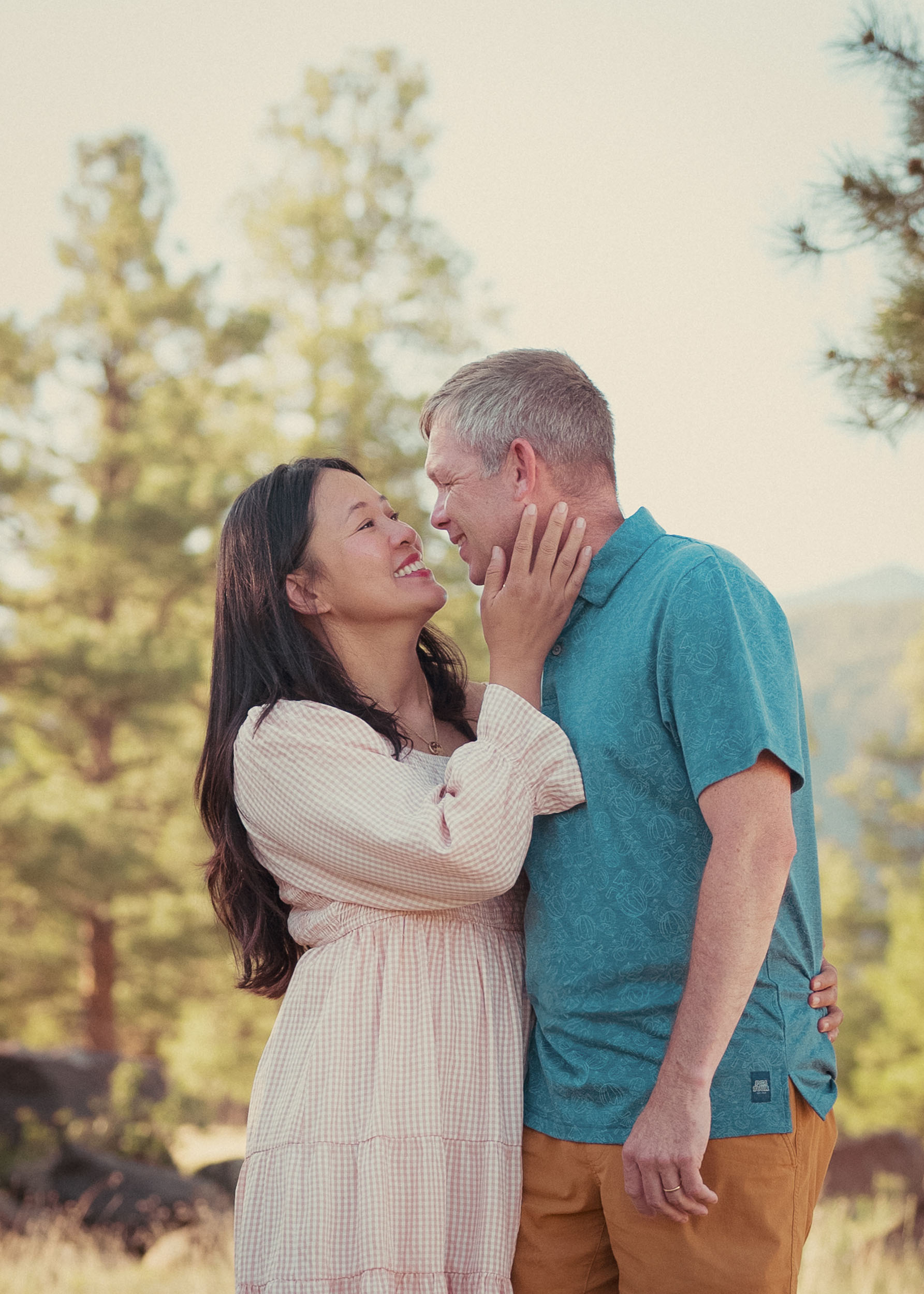 couple embracing and gazing at eachother