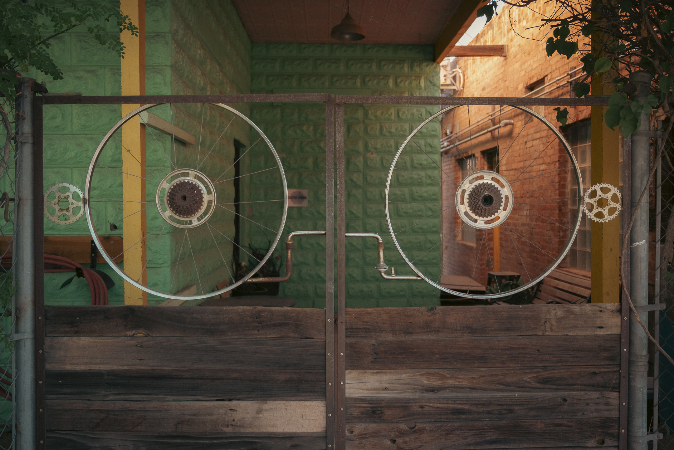 Gate made with bicycle wheels.
