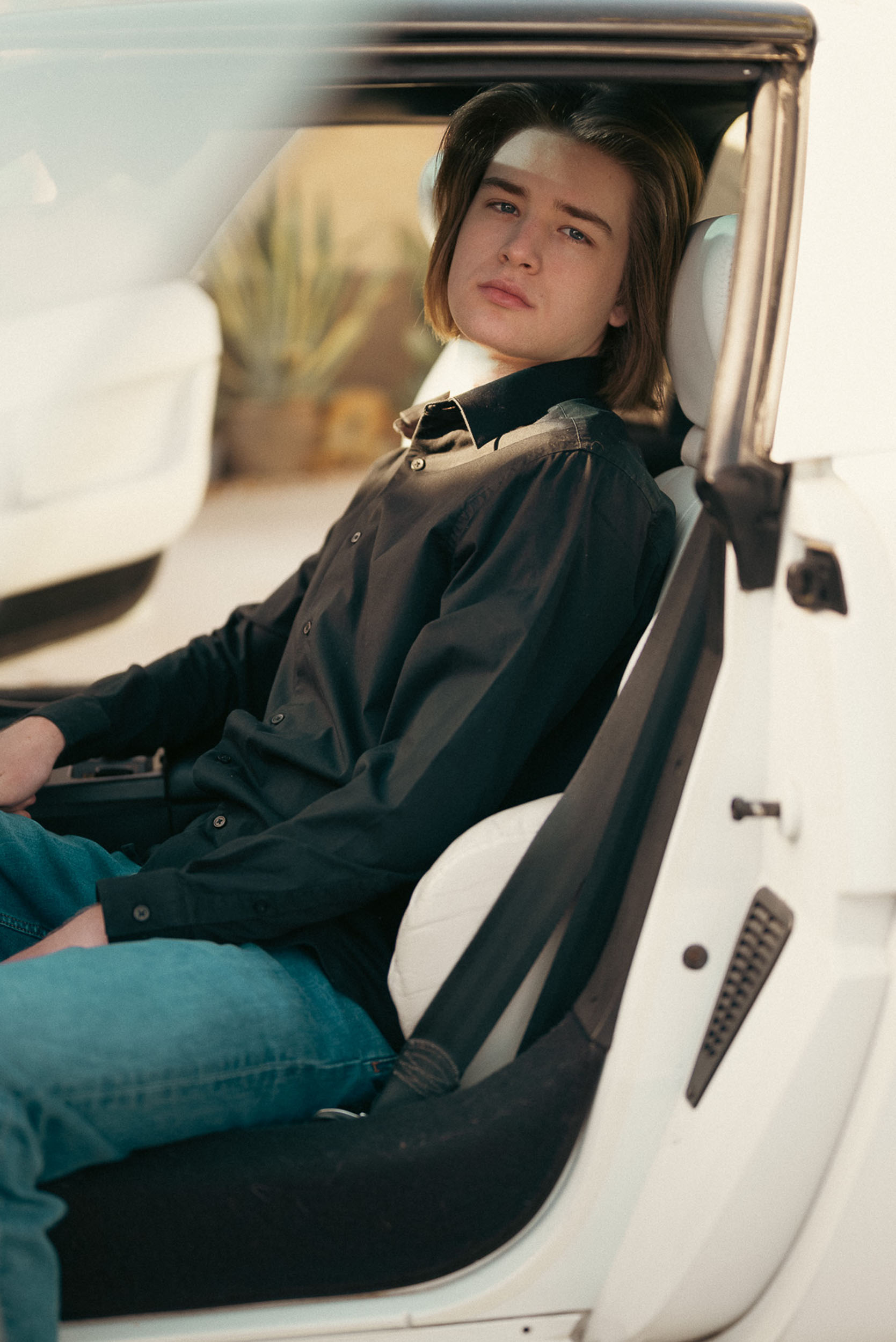 young man in a corvette zr1