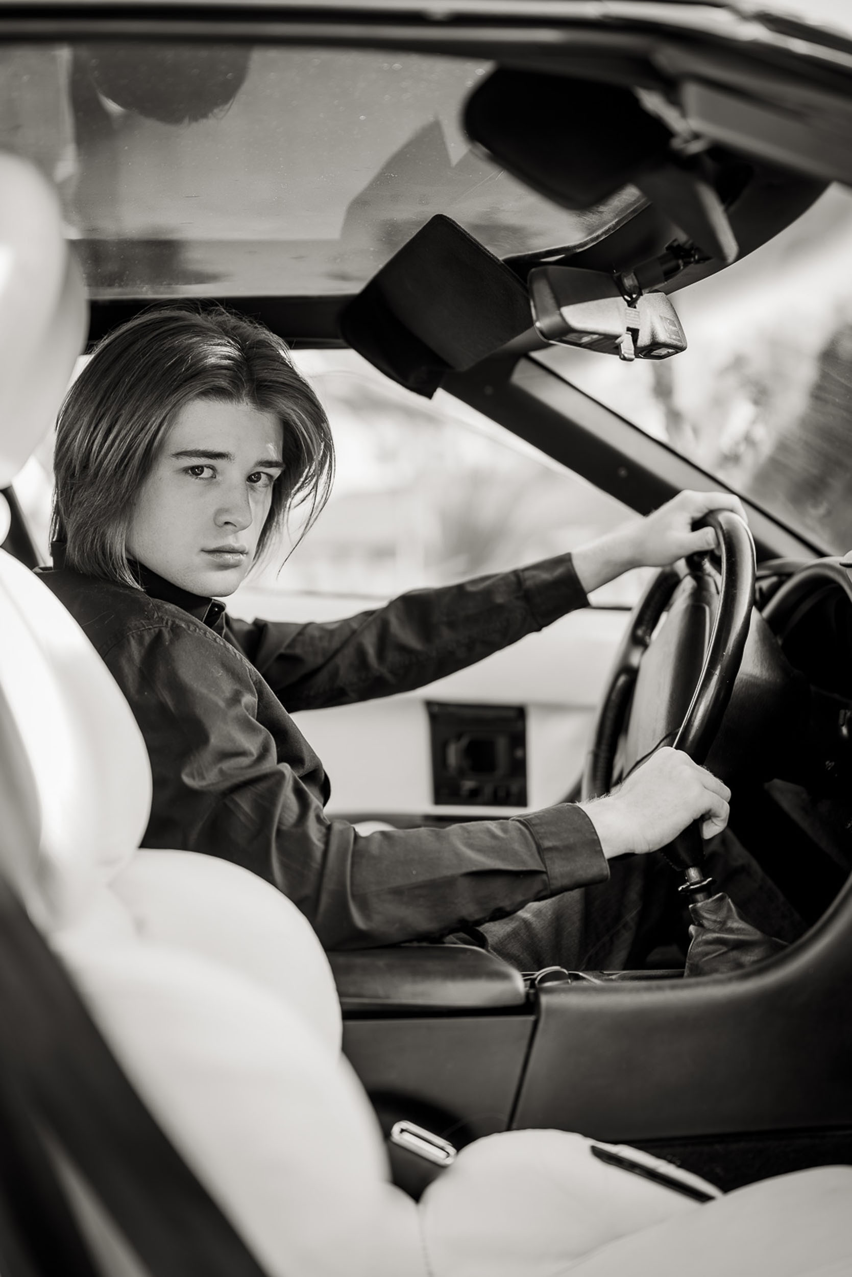 young man in a zr1 corvette